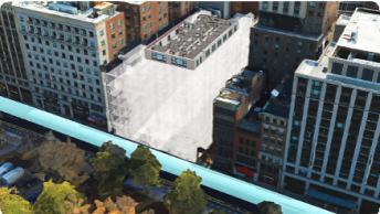 Image of a building’s infrastructure using BIM alongside other completed buildings on a city road 