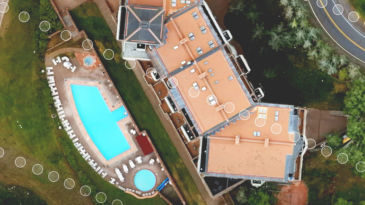 A nadir image of a multi-unit building with a swimming pool,A nadir image of a multi-unit building with a swimming pool