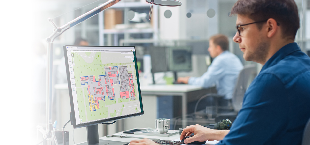 Business user on a cell phone wayfinding to a point of interest with an indoor mapping app