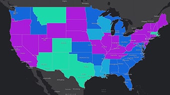 Carte sombre des États-Unis sur laquelle les États apparaissent en vert vif, en violet, en bleu clair et en bleu foncé