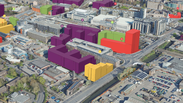 A cityscape with green trees, blue sky, and tall buildings showing select buildings highlighted in red for development