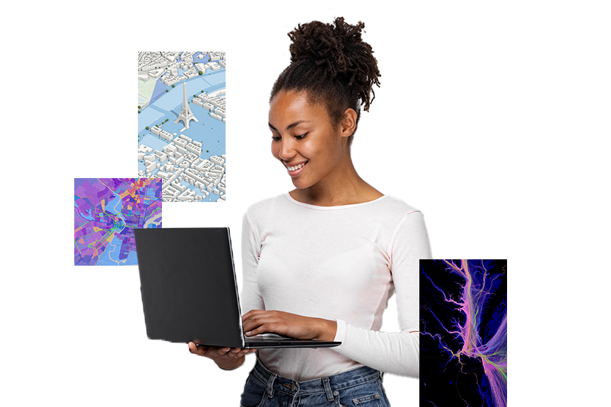 A young girl wearing a white top typing on a black laptop