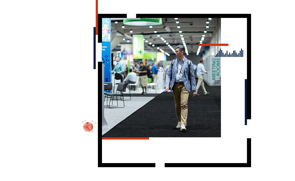 Person walking through a conference exhibit hall