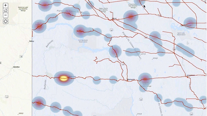Light blue map with darker blue irregular spots and a video play button