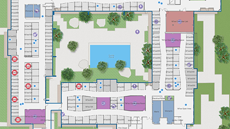 Aerial view of a digital building with squares, green trees, and blue water representing a n indoor data management interface