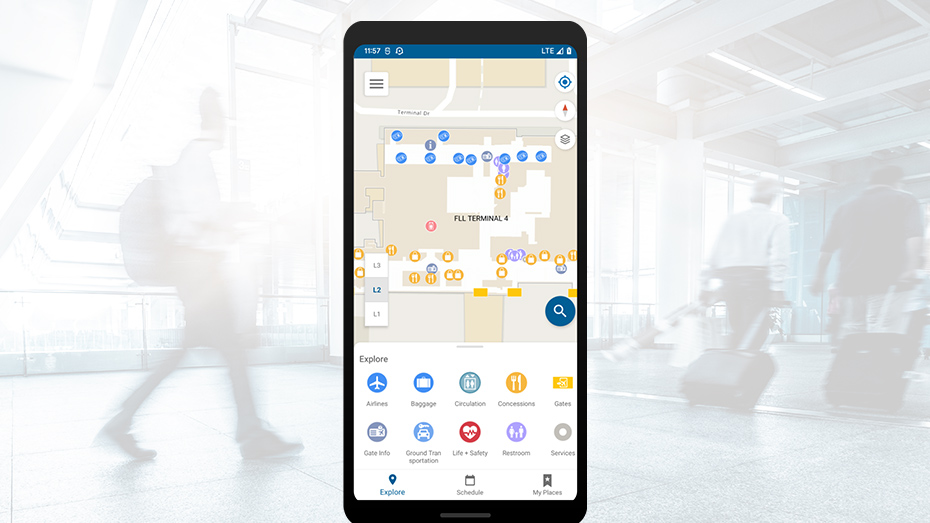 A mobile phone screen showing an indoor map with scattered blue and yellow circles and round icons