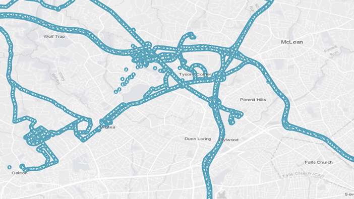 Light gray street map with scattered blue data points and several routes highlighted in blue throughout the map