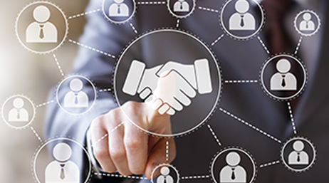 Round digital icons of a person connected by lines with an illustration of two hands shaking in the middle