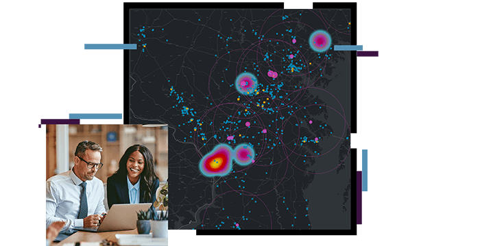 Man and woman looking at a laptop, dark heat map