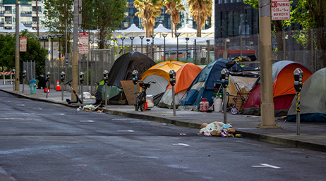 tents on a city sidewalk 