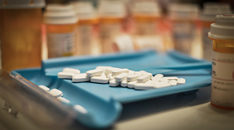 pills on a pharmacy dispenser
