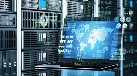 Computer showing a world map in front of a server room