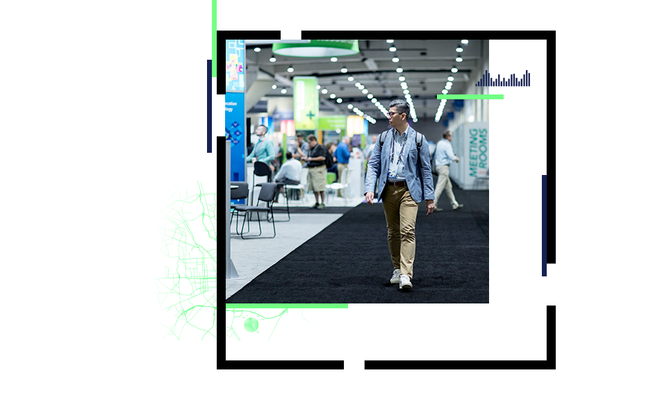 Man walking through exhibition hall at a conference