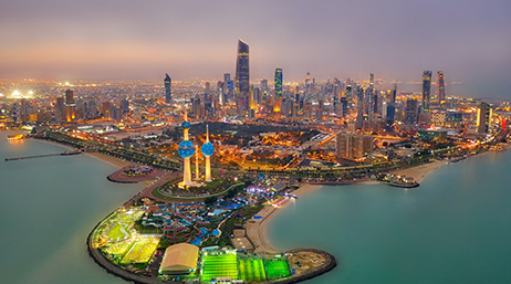 A green space in Kuwait with skyscrapers in the background