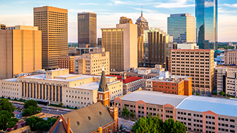 A bird’s eye view of a city skyline at golden hour