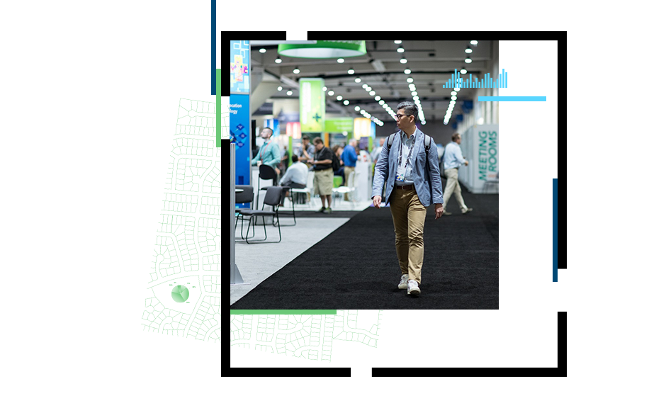 person walking through a conference hall