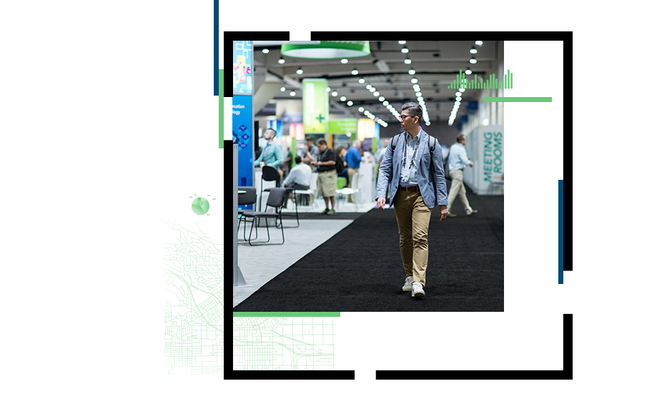 Person walking through a conference exhibit hall