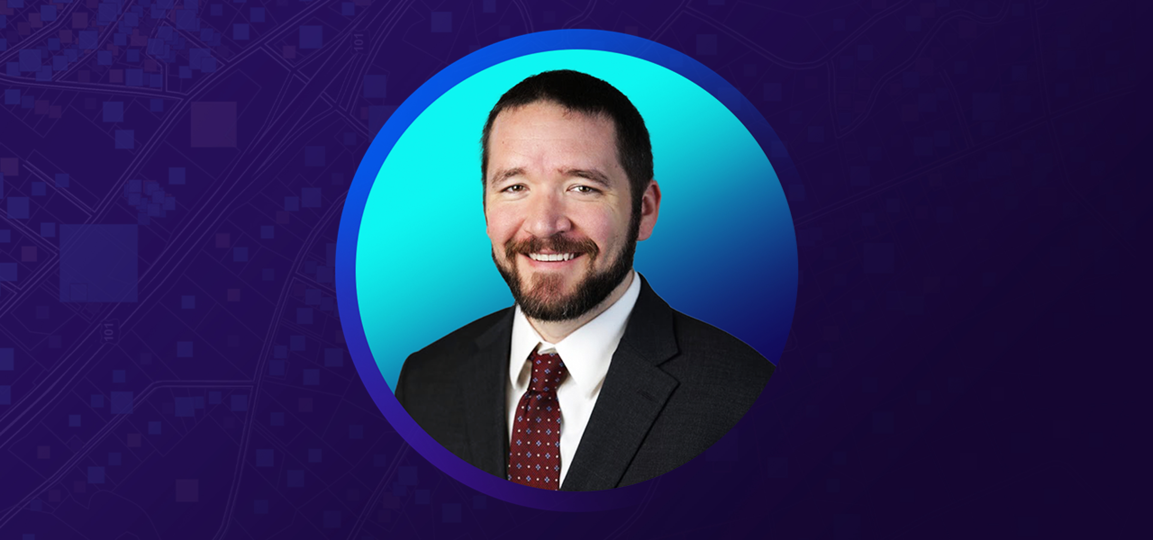 Josh Rhamy smiling and wearing a suit and tie overlaid on a blue and purple graphic background