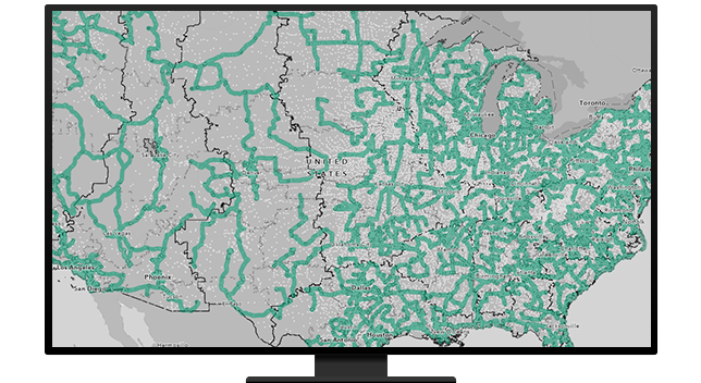 A graphic of a computer monitor displaying a road map of North America in grays and greens