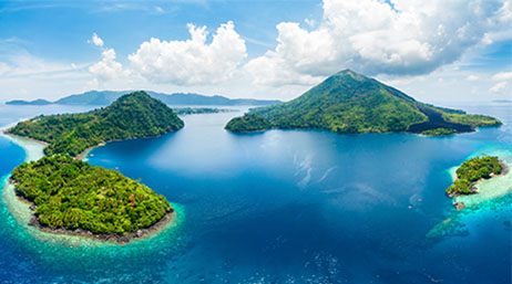 An aerial view showing a set of small and large islands