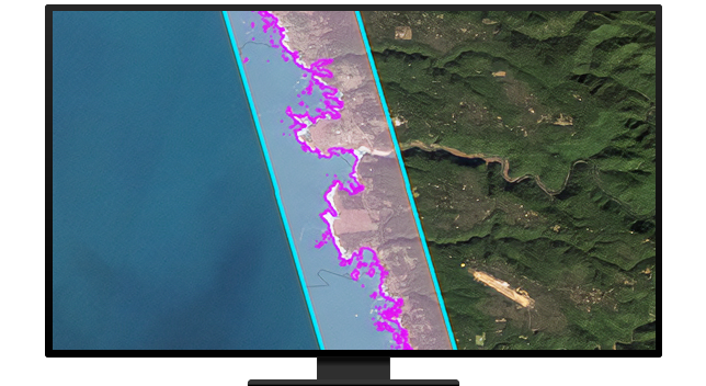 A monitor displaying a coastal map marked in purple