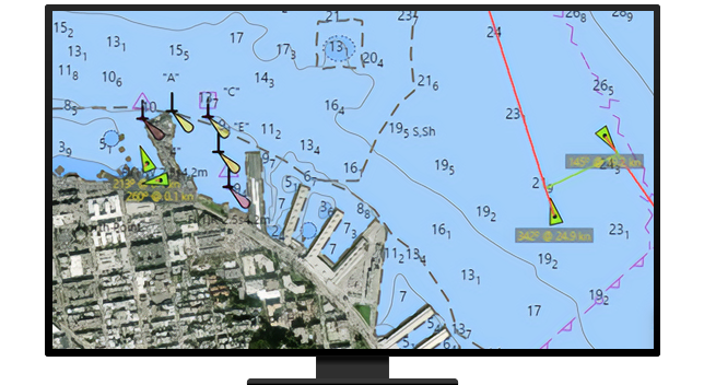 A monitor displaying a colorful land and water dot map