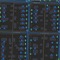 A street map in shades of gray with water utility features traced in blue with yellow icons