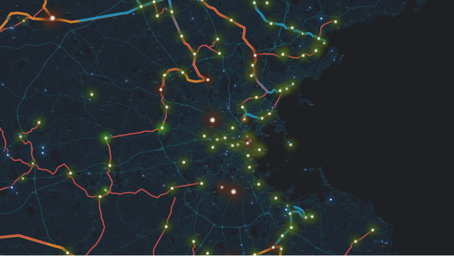 A dark gray and blue map with roads and map points in neon orange and green