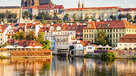 Prague, Czech Republic buildings from across a small lake on a beautiful bright day