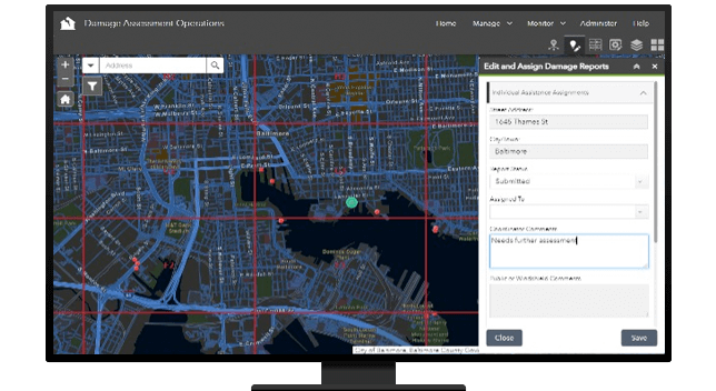 A desktop computer displaying a damage assessment operations dashboard