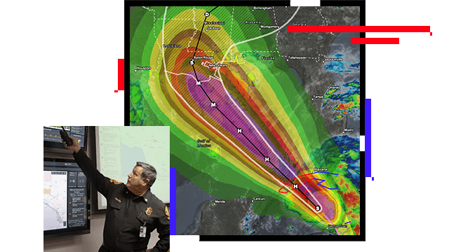 A topographic map that informs agencies about weather patterns and areas that will be affected by weather systems, and a police officer in a debrief room pointing at a screen with information on it