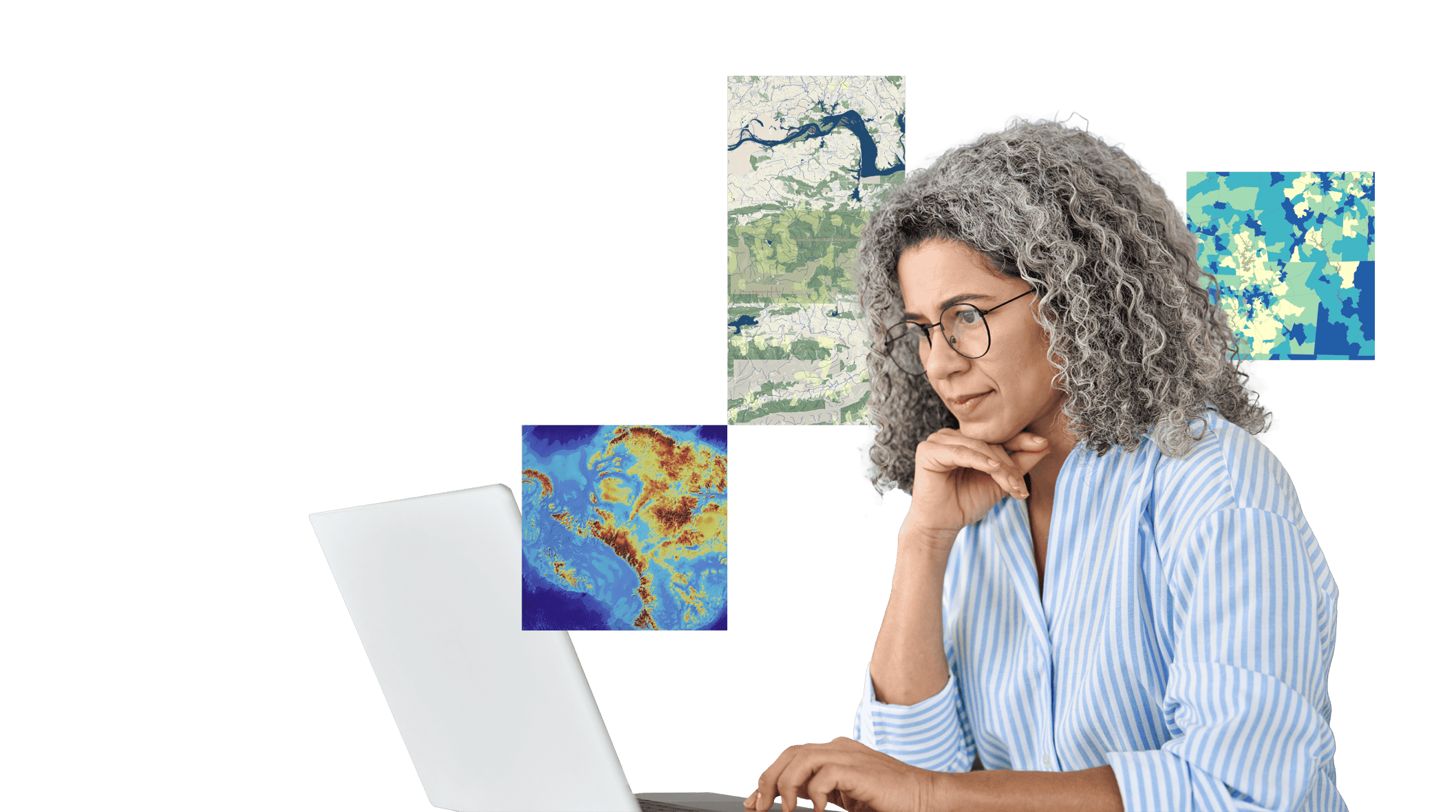 A person wearing glasses and a blue striped collared shirt looking thoughtfully at a laptop display, overlaid with three small colorful projecting maps