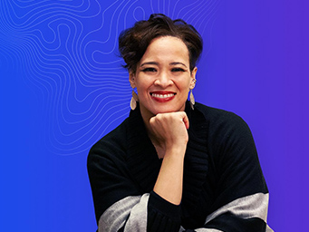 A headshot of Laura O’Brien, executive vice president of operational excellence at CBRE, smiling at the camera